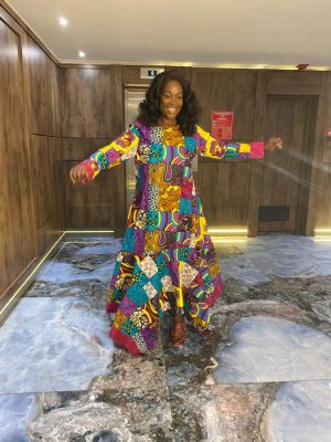 Ankara dress trimmed with asoke 
(Size 18)
- FMU1242