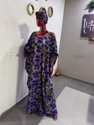 Adire boubou beaded on the neck with inner rope Free size (Size 12-18)
- FMU1034